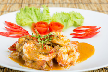 Curry fried shrimps and cooked rice