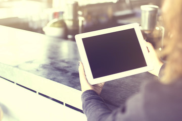Girl hands using digital tablet