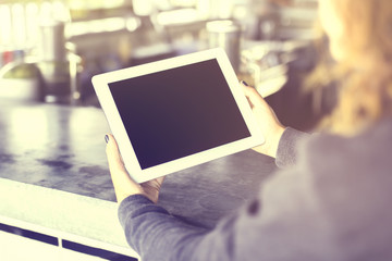 Girl hands with blank digital tablet, mock up