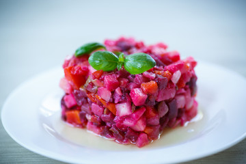 salad of boiled vegetables with beets