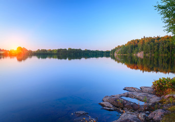 Fototapeta na wymiar Beautiful evening at the reservoir in Finland and the Aland Islands