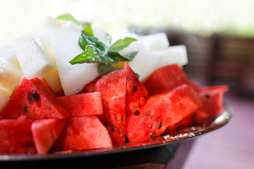 Sliced melon and watermelon