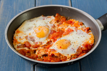 fried eggs with vegetables