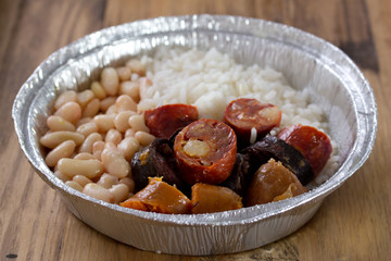 typical portuguese sausages with rice and beans
