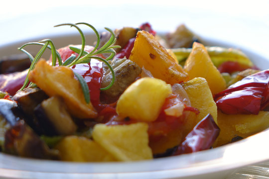 Ratatouille made of eggplant, zucchini, tomato and pepper