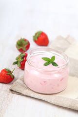 Strawberry yogurt and ripe strawberry