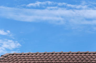 Naklejka premium House roof and blue sky.