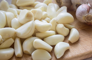 Peeled garlic cloves cooking