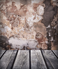 Fototapeta premium wooden table background with old wall. empty table for product display montages