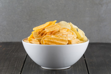 potato chips on wood background