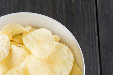 potato chips on wood background