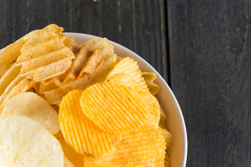 potato chips on wood background