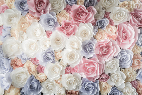 Backdrop of colorful paper roses © Wichit S