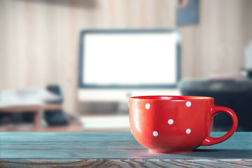 Red cup on office desk