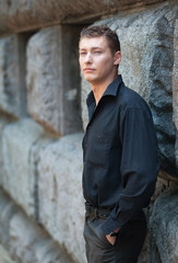 Obraz premium Street portrait of a young slavonic man