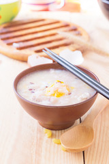 Healthy rice soup, congee mixed with pork and eggs