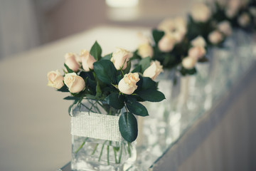 Wedding table with white roses.