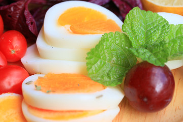 fresh red spinach salad and cream on wooden table