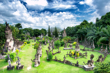 Amazing view of mythology and religious statues at Wat Xieng Khuan Buddha park. Vientiane, Laos - obrazy, fototapety, plakaty
