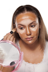 face shading with different shades of liquid foundations