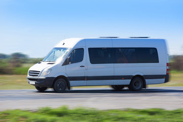 minibus goes on the country highway