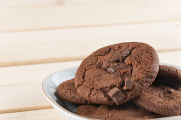 soft dark chocolate brownie cookies on wood