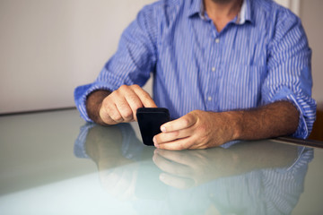 closeup of man holding a phone