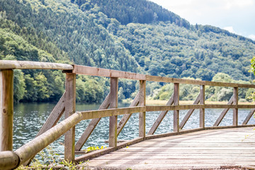 Fototapeta na wymiar wooden bridge on the river