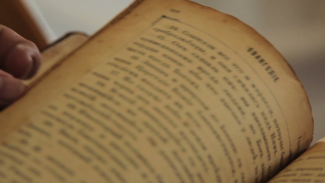 Old Russian Vintage Book Being Held and Looked Through 