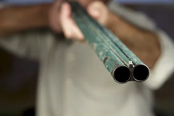Zelfklevend Fotobehang Gunpoint of double-barreled shotgun, pointing to camera © Alonso Aguilar