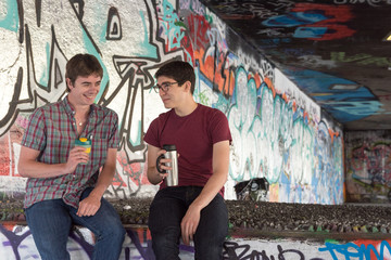 Obraz na płótnie Canvas Two Guys Coffee Chat Guys Coffee Chat