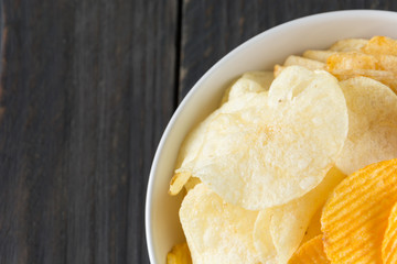 potato chips on wood background