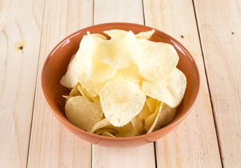 potato chips on wood background