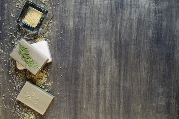 Soap and bath salt on the wooden background