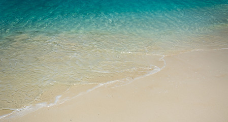 sea on the sand beach - vintage film filter