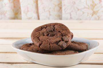 soft dark chocolate brownie cookies on wood