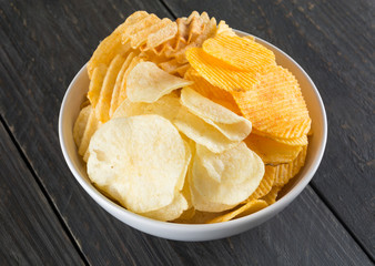 potato chips on wood background
