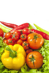 Mixed collection of vegetables isolated on a white background. Bowl of salad with fresh organic vegetables for healthy.