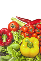Mixed collection of vegetables isolated on a white background. Bowl of salad with fresh organic vegetables for healthy.