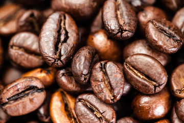 Brown coffee beans, close up of coffee beans for background and