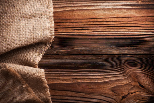 Burlap texture on wooden table background