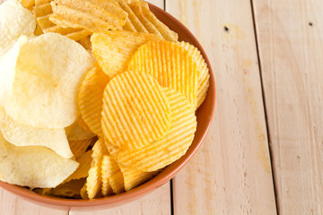 potato chips on wood background
