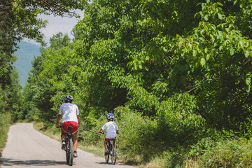 Obraz premium Father and son cycling