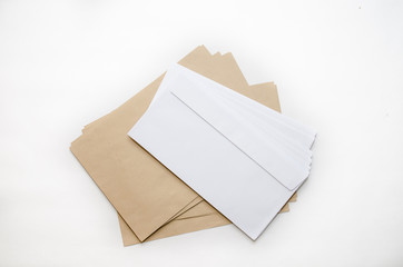Brown and white envelopes isolated on a white background