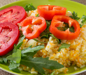 Rice with vegetables and rucola