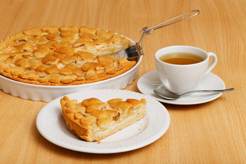 Piece of homemade pie with apples and pears