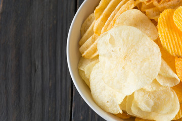 potato chips on wood background