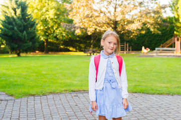 A young little girl preparing to walk to school © annanahabed