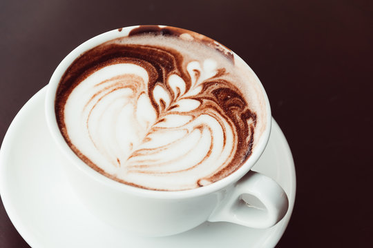 chocolate latte - soft focus with vintage film filter © topntp