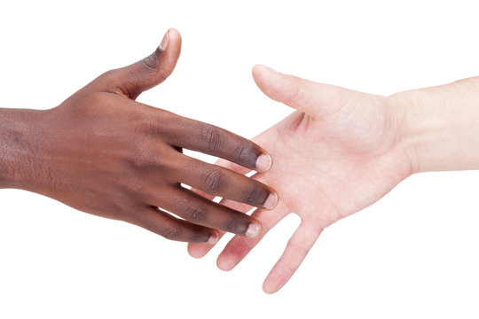 Image of a caucasian and african man shaking hands, isolated on